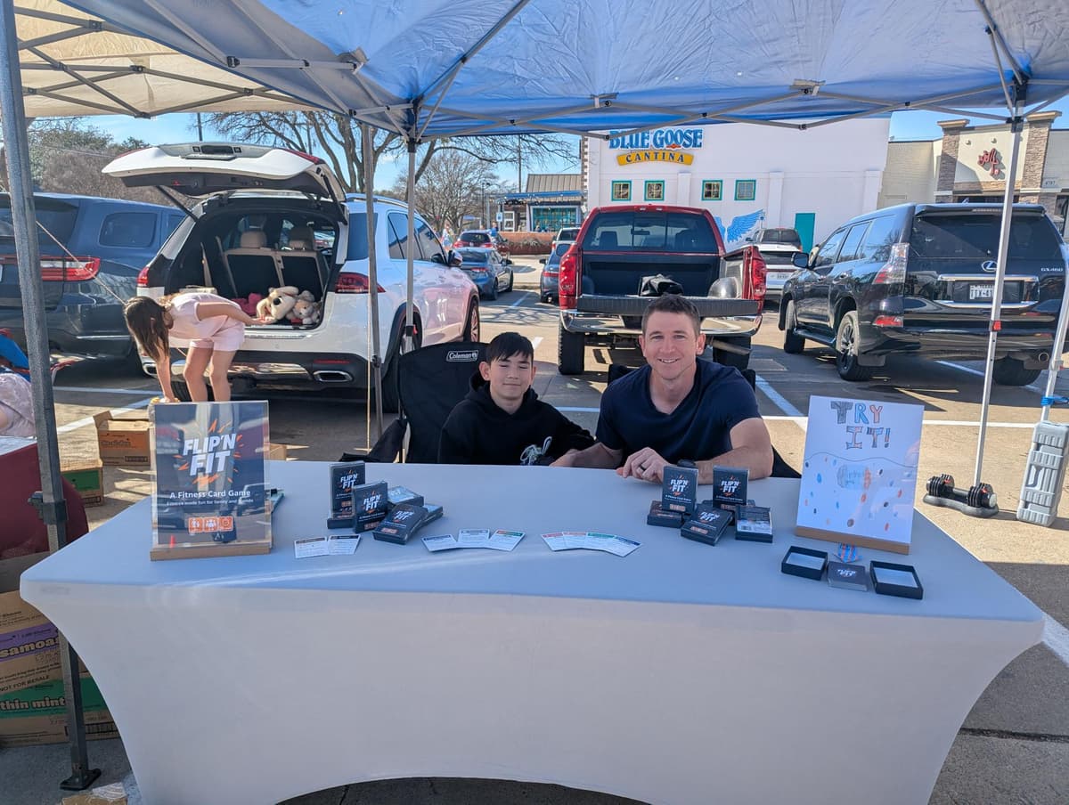 Selling Flip'n Fit at the farmers market with my son